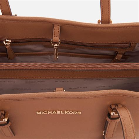 michael michael kors signature jet set large east west tote|Michael Kors airplane bag.